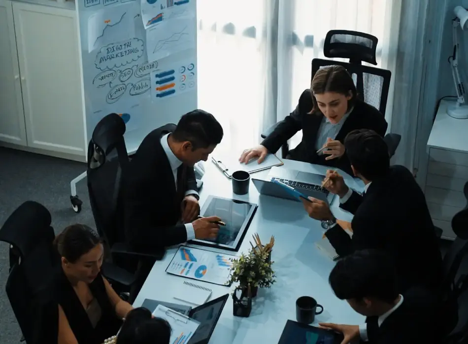 top-view-skilled-businesspeople-working-together-meeting-directorate 1 (1)