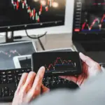 midsection-man-using-smart-phone-office 1 (1)