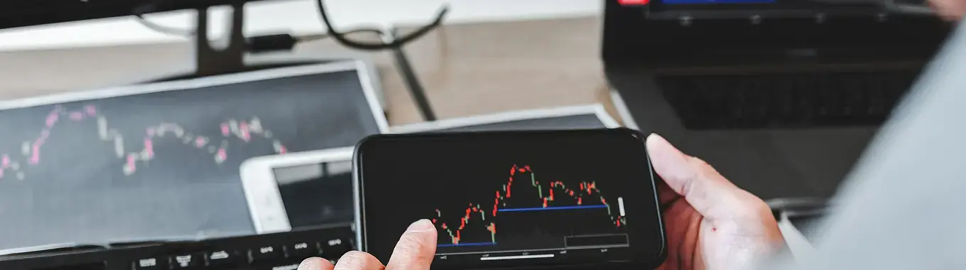 midsection-man-using-smart-phone-office 1