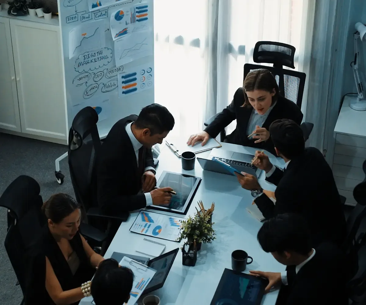 top-view-skilled-businesspeople-working-together-meeting-directorate 1 (1)